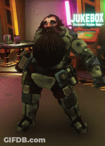 A Man With A Beard In Front Of A Jukebox GIF