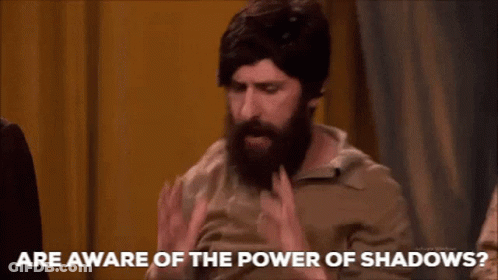 Bearded Man Asking About Power Of Shadows GIF