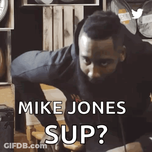 A Man With A Beard Is Asking Mike Jones To Sup GIF