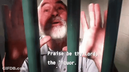 A Man With A Beard Is Behind Bars With The Words Praise Be Thy Lord The Liquor GIF