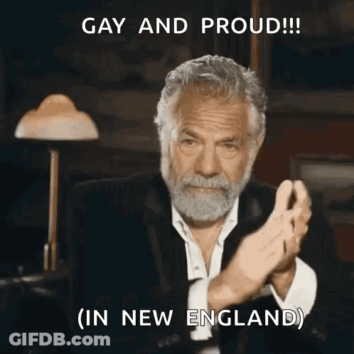 A Man With A Beard Is Clapping His Hands And Says Gay And Proud GIF