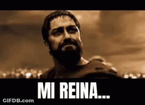 A Man With A Beard Is Crying In Front Of A Crowd With The Words Mi Reina Written Below Him GIF