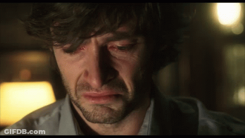 A Man With A Beard Is Crying With Tears Coming Out Of His Eyes GIF