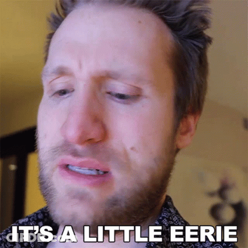 A Man With A Beard Is Crying With The Words It 'S A Little Eerie Written Below Him GIF