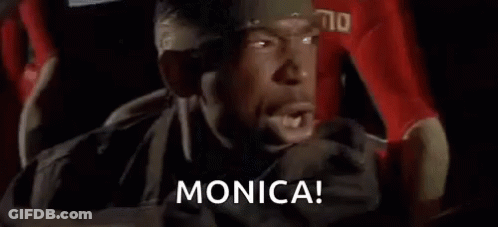A Man With A Beard Is Driving A Car And Yelling At Someone . GIF