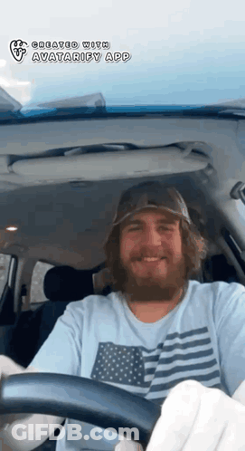 A Man With A Beard Is Driving A Car With The Avatarify App On The Screen GIF