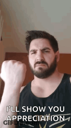 A Man With A Beard Is Giving A Fist Bump And Says I 'Ll Show You Appreciation GIF