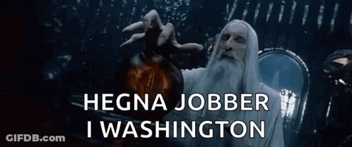 A Man With A Beard Is Holding A Bottle With The Words " Hegna Jobber I Washington " Above Him GIF