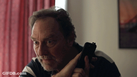 Man With Beard Holding Cell Phone GIF