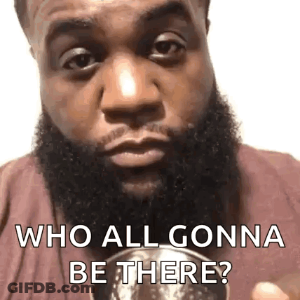 A Man With A Beard Is Holding A Cup And Asking Who All Gonna Be There ? GIF