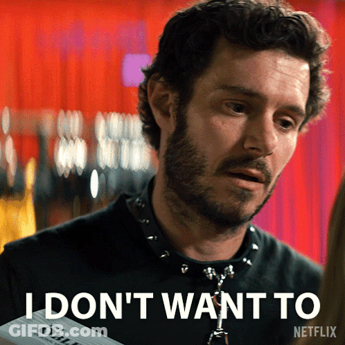 A Man With A Beard Is Holding A Piece Of Paper That Says I Don 'T Want To GIF