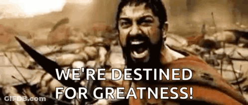 A Man With A Beard Is Holding A Sword And Screaming In A Movie Scene . GIF