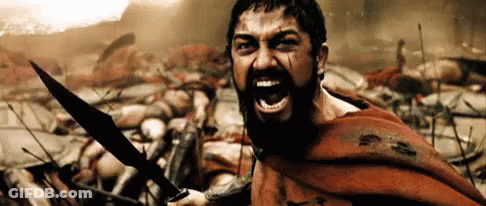 Bearded Man Holding Sword Yelling In Battle GIF