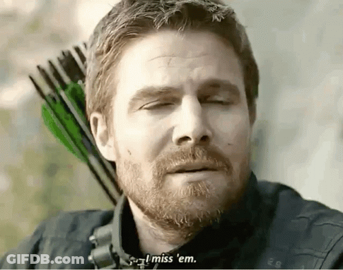A Man With A Beard Is Holding An Arrow And Saying I Miss Em GIF