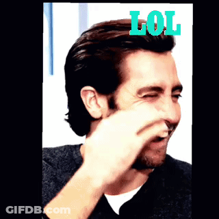 A Man With A Beard Is Laughing With The Word LOL On Top Of Him GIF