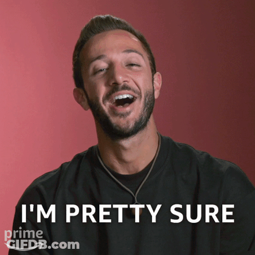 A Man With A Beard Is Laughing With The Words I 'M Pretty Sure Behind Him GIF