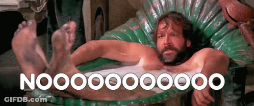A Man With A Beard Is Laying In A Bathtub With The Words Nooo On The Bottom Right GIF