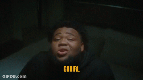 A Man With A Beard Is Laying On A Bed And The Word Giiiiirl Is Above Him GIF