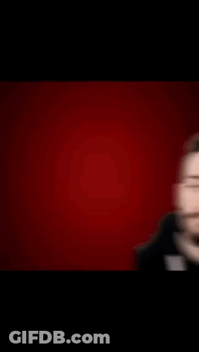 A Man With A Beard Is Looking At A Yes Or No Button GIF