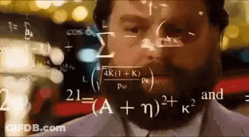 A Man With A Beard Is Looking At Mathematical Equations On A Screen . GIF