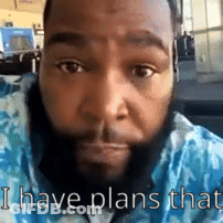 A Man With A Beard Is Looking At The Camera And Says I Have Plans That GIF