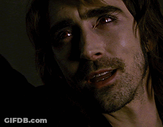 A Man With A Beard Is Looking At The Camera With His Mouth Open GIF