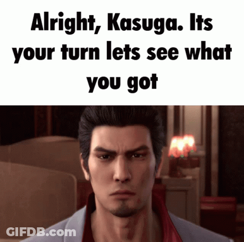 A Man With A Beard Is Looking At The Camera With The Words Alright Kasuga Its Your Turn Lets See What You Got GIF