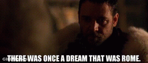 A Man With A Beard Is Looking At The Camera With The Words There Was Once A Dream That Was Rome Below Him . GIF