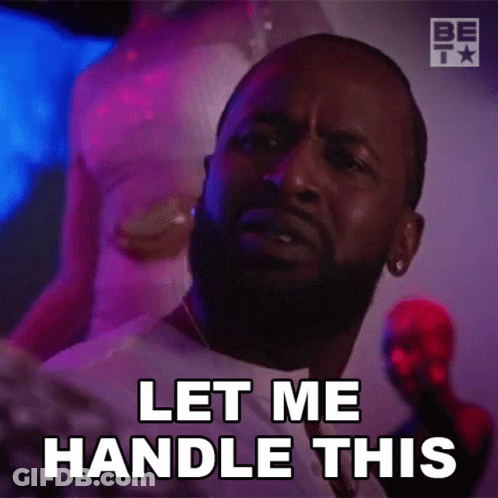 A Man With A Beard Is Making A Face And Says Let Me Handle This . GIF