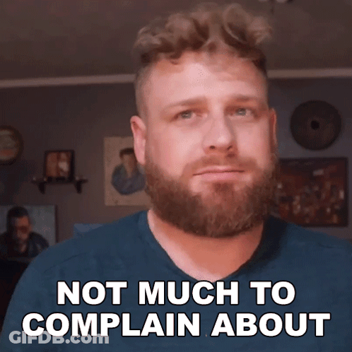 A Man With A Beard Is Making A Face And Says Not Much To Complain About GIF