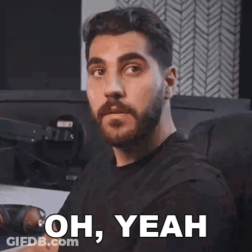 A Man With A Beard Is Making A Face And Says Oh Yeah GIF