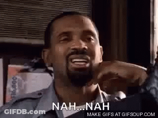 A Man With A Beard Is Making A Funny Face And Saying `` Nah Nah '' . GIF