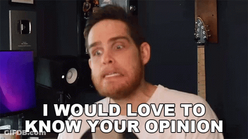 A Man With A Beard Is Making A Funny Face And Says `` I Would Love To Know Your Opinion '' . GIF