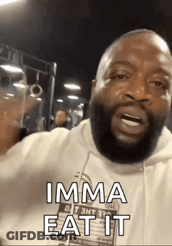 A Man With A Beard Is Making A Funny Face And Says Imma Eat It . GIF