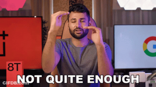 A Man With A Beard Is Making A Funny Face And Says Not Quite Enough GIF