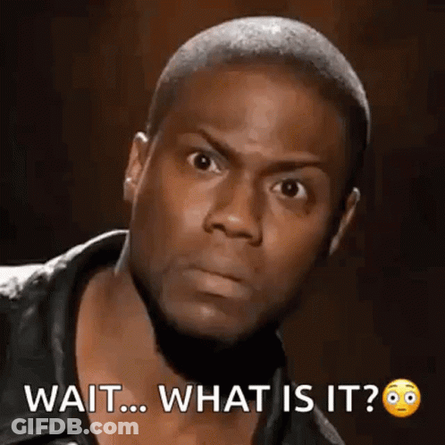 A Man With A Beard Is Making A Funny Face And Says `` Wait ... What Is It ? '' GIF