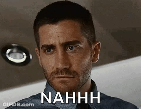 A Man With A Beard Is Making A Funny Face And The Word Nahh Is On His Face . GIF