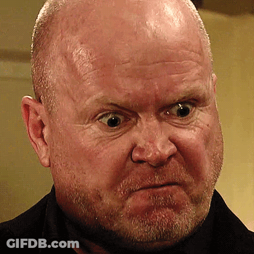 A Man With A Beard Is Making A Funny Face GIF