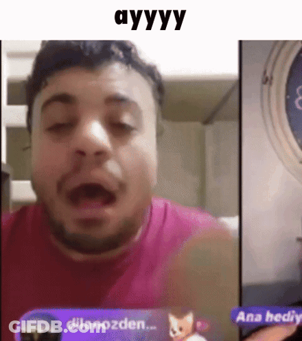 A Man With A Beard Is Making A Funny Face While Talking To Someone On A Video Call . GIF