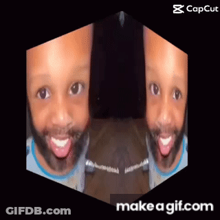 A Man With A Beard Is Making A Funny Face With His Tongue Out And The Words Make A Gif.com Below Him GIF