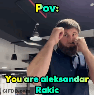 A Man With A Beard Is Making A Funny Face With The Caption " Pov : You Are Aleksandar Rakic " GIF