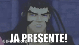 A Man With A Beard Is Making A Funny Face With The Words Ja Presente Written Below Him GIF