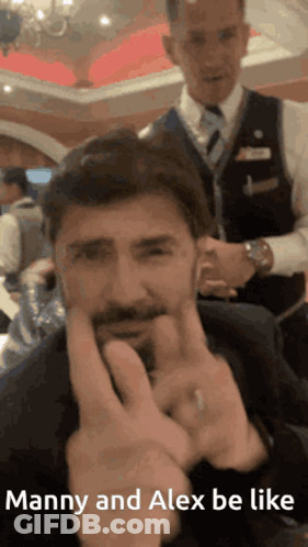 A Man With A Beard Is Making A Funny Face With The Words Manny And Alex Be Like Below Him GIF