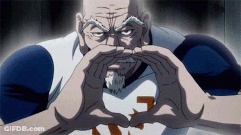 A Man With A Beard Is Making A Heart Shape With His Hands And The Number 3 Is On His Shirt GIF