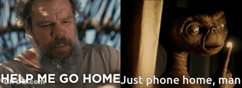 A Man With A Beard Is Next To An Alien Holding A Candle With The Words Help Me Go Home Just Phone Home Man GIF