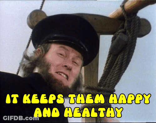 A Man With A Beard Is On A Boat With The Words It Keeps Them Happy And Healthy Above Him GIF