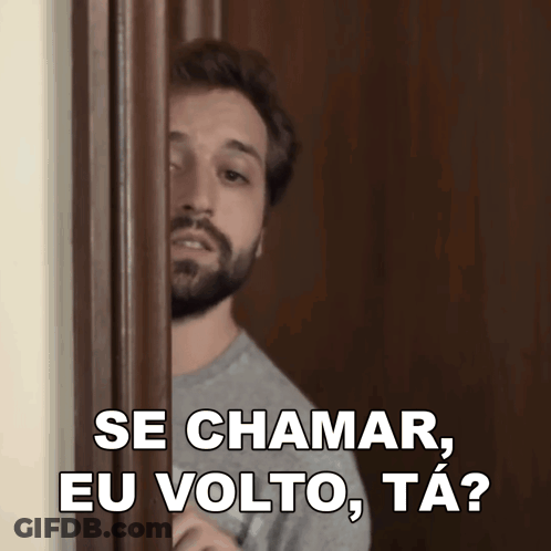 A Man With A Beard Is Peeking Through A Door And Says Se Chamar Eu Volto Ta ? GIF