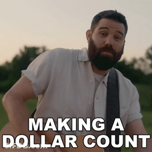A Man With A Beard Is Playing A Guitar And The Caption Says Making A Dollar Count GIF