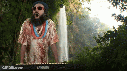 A Man With A Beard Is Playing A Yamaha Keyboard GIF