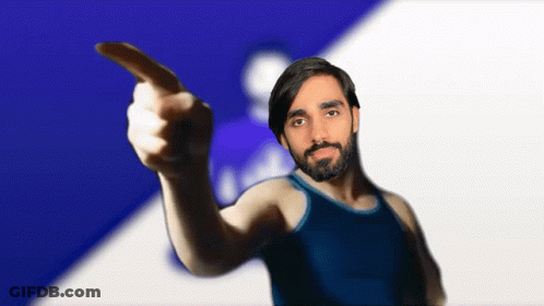A Man With A Beard Is Pointing His Finger GIF
